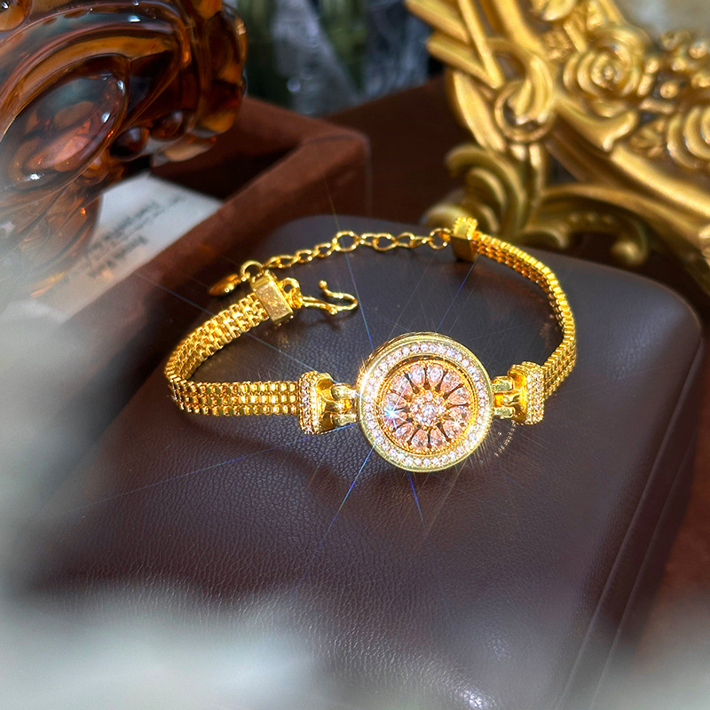 Luxury Watch Service - Złoty zegarek bransoletka z obrotowym kompasem